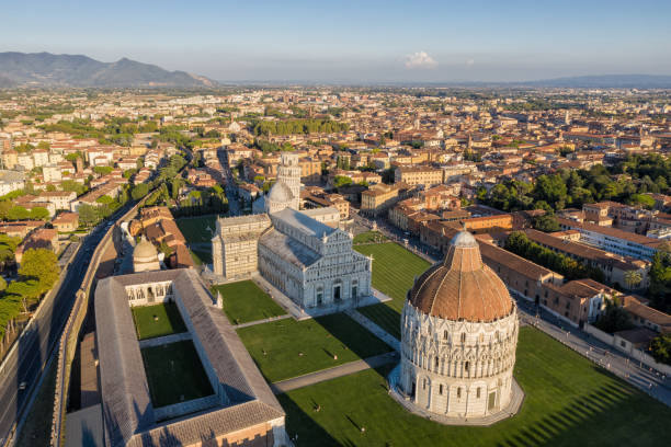 istock Fields of Miracles & Leaning Tower of Pisa - Aerial at Sunset 1062800536