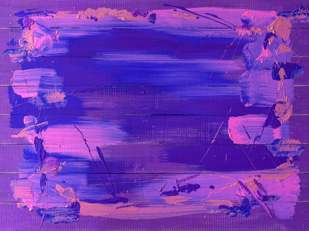 istock Violet, pink and blue abstract painted worn wood panel board background. 1062805470