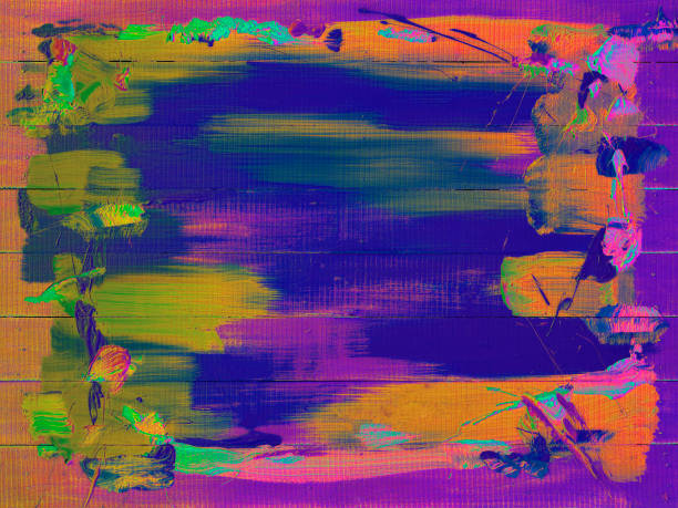 istock Violet, pink, blue, orange, yellow and green, multi colored abstract painted worn wood panel board background. 1062805476