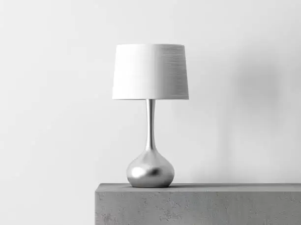 Photo of Stylish table lamp in white room