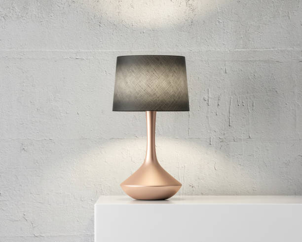 stylish table lamp mockup with black shade and gold stand on white table - lamp imagens e fotografias de stock