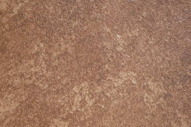 istock Old dried paint on the old wall. 1062817816