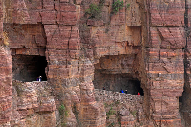 istock Tourists and vehicles on the wall highway