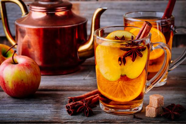 istock Hot mulled apple cider drink with cinnamon stick, cloves and anise 1062851404