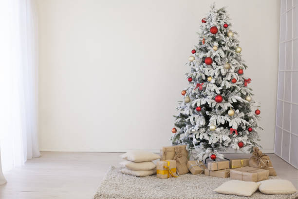 istock Christmas tree with gifts for the new year 1062851910