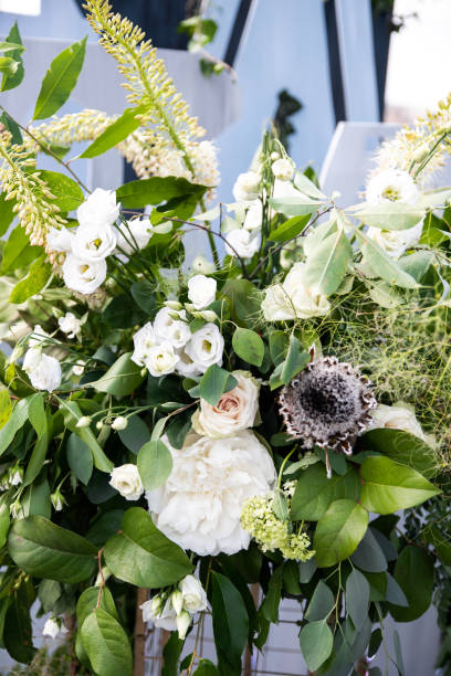 istock Green bouquet with tree branches, white flowers and eucalyptus 1062855788