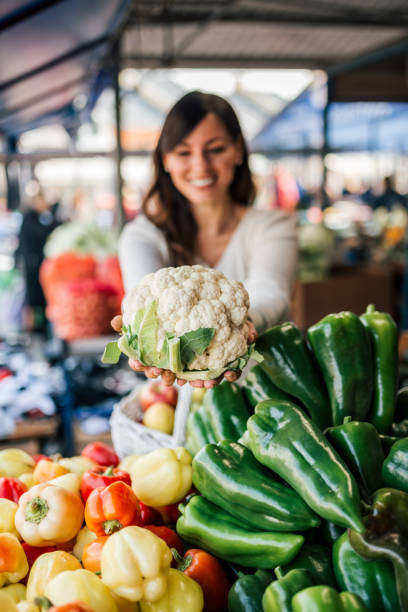 istock Buying fresh vegetables. Focus on the foreground. 1062863416