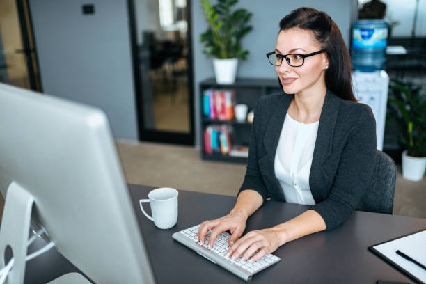 istock Beautiful business woman working on her computer. 1062867506