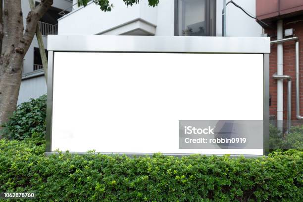 Large Blank Billboard On A Street Wall Banners With Room To Add Your Own Text Stock Photo - Download Image Now