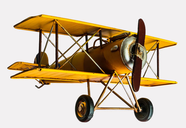 istock Yellow Toy Airplane isolated, white background 1062880682