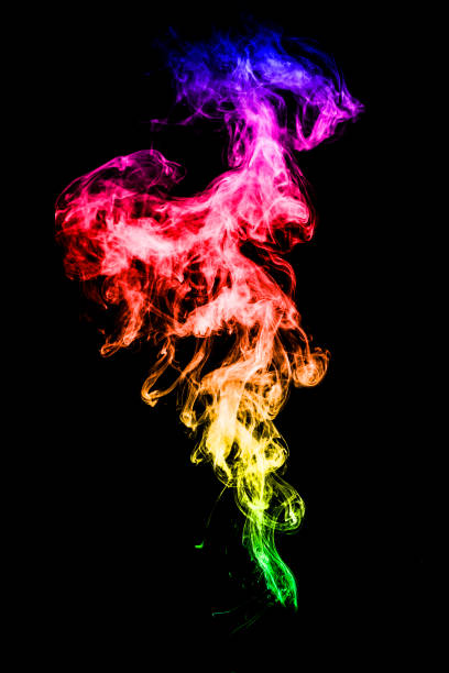 istock Abstract colorful background. Moving smoke isolated on black background. 1062881882