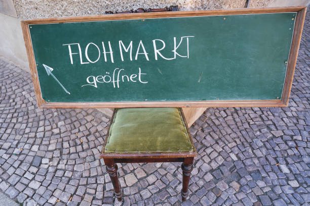 Sign with the inscription flea market in the old town of Quedlinburg in Germany
