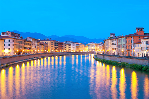 River Arno at night Pisa Italy