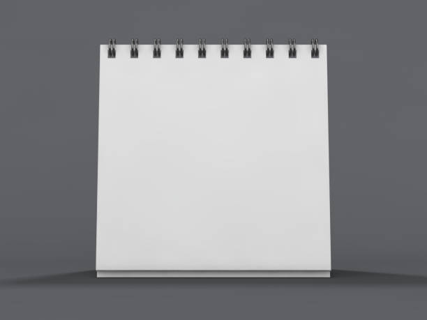 istock Empty desk calendar on table. Mockup design concept. 3D 1062890578