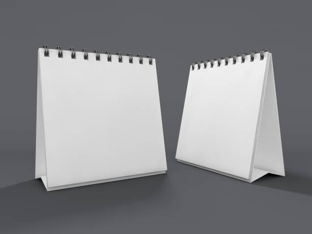 istock Empty desk calendar on table. Mockup design concept. 3D 1062890638
