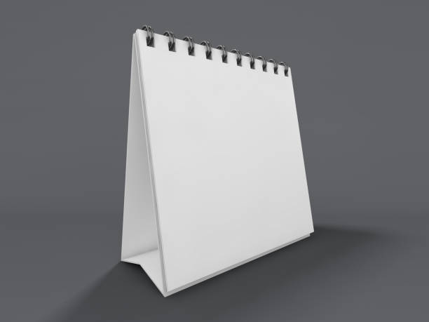 istock Empty desk calendar on table. Mockup design concept. 3D 1062890640