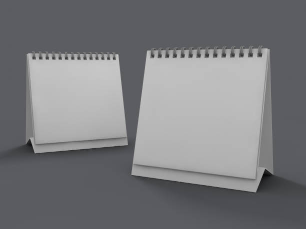 istock Empty desk calendar on table. Mockup design concept. 3D 1062891718