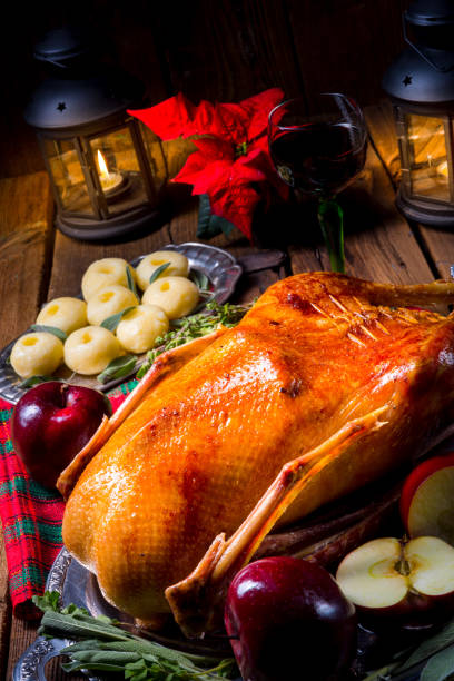 istock festive stuffed roast goose with red cabbage and dumplings 1062898728