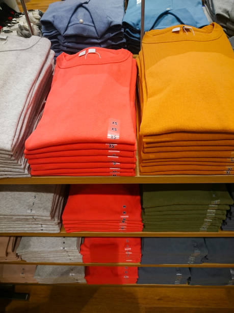 istock Men's shirts on store shelves 1062901034