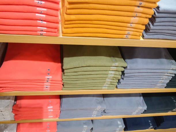 istock Men's shirts on store shelves 1062901170
