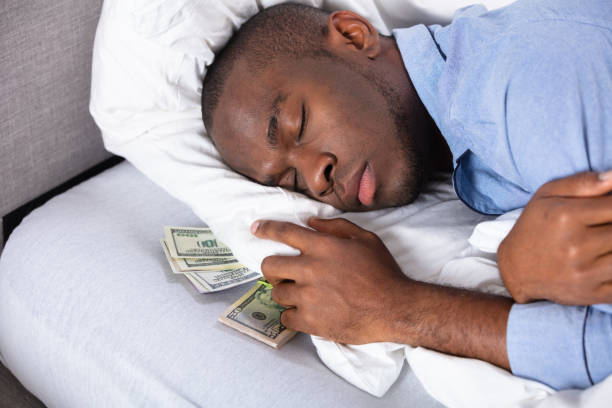 istock Young Man Sleeping On Bed In Bedroom 1062905420