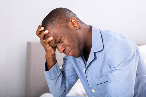 istock Side View Of A Young Man With Headache 1062905502