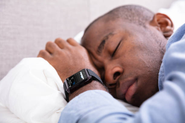 istock Man Sleeping With Smart Watch In His Hand 1062905510