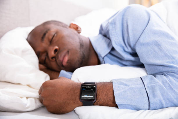 istock Man Sleeping With Smart Watch In His Hand 1062905524