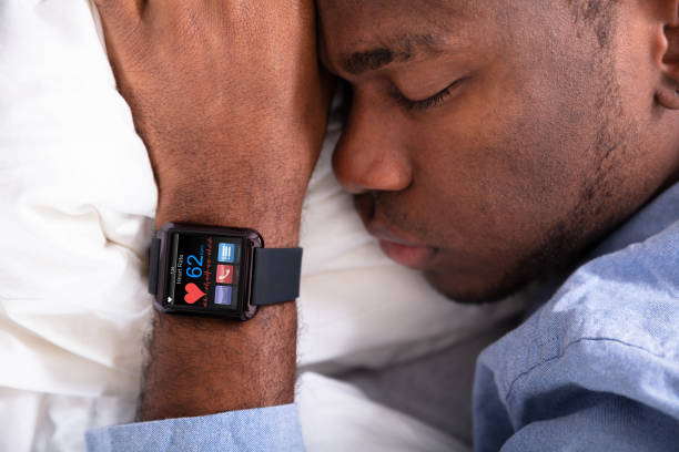 istock Man Sleeping With Smart Watch In His Hand 1062905672