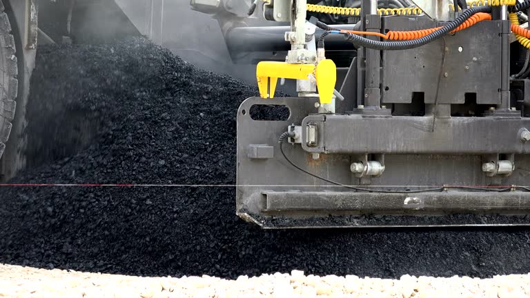 Road Construction. Asphalt Paving Machines, close up