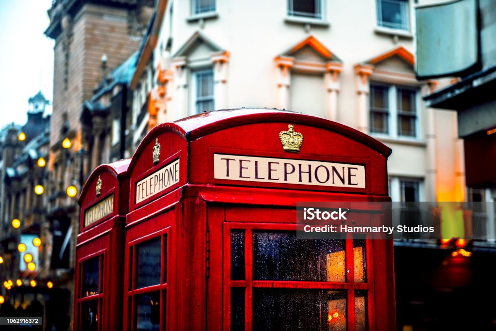 Classic British red colored pay telephone booths  in London, England, UK Classic British red colored pay telephone booths  in London, England, UK. Horizontal composition. London - England Stock Photo