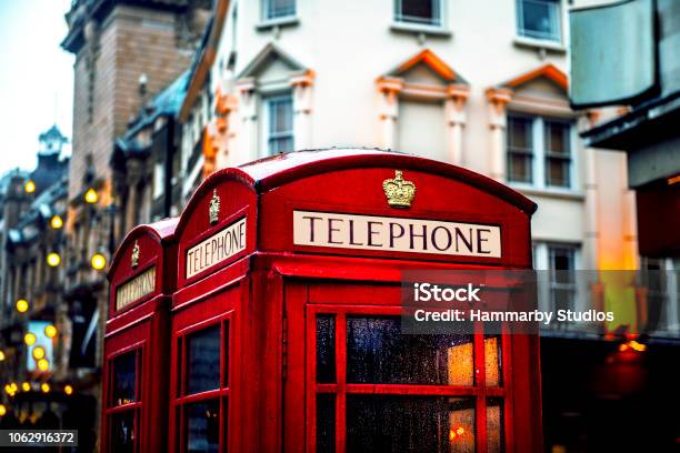 Classic British Red Colored Pay Telephone Booths In London England Uk Stock Photo - Download Image Now