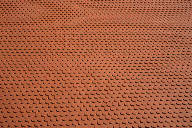 istock roof with orange roof tiles 1062927574