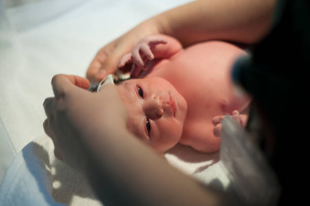 istock newborn baby head measure 1062933264