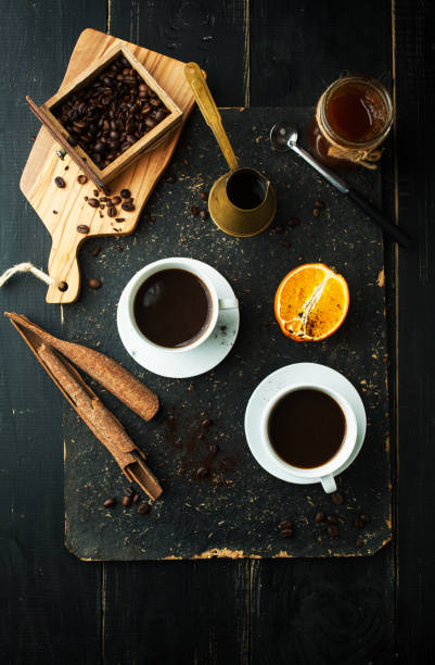 istock Cup of coffee, cinnamon and beans 1062934614