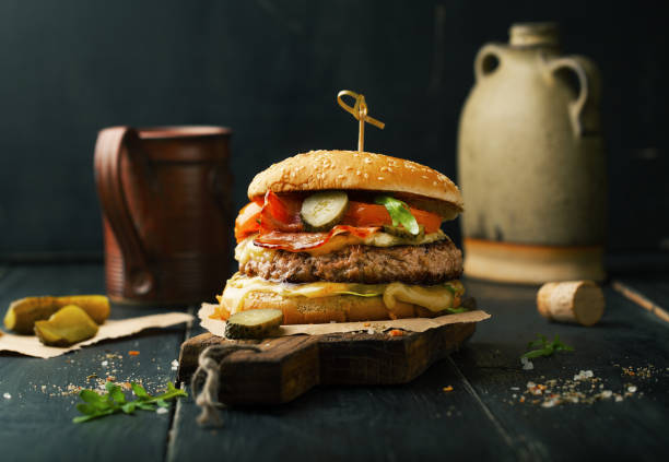 istock Delicious burger with meat and ingredients 1062934816