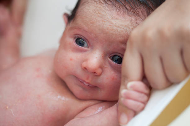istock newborn baby bathing 1062941198