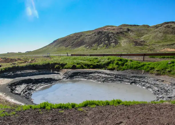 Photo of Mud hot pool in geothermal active area Krysuvik, Seltun, Global Geopark, Geothermal active area in Iceland, Europe