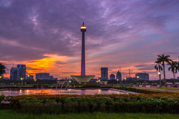 Beatiful landscape of Medan Merdeka Square, Jakarta under the cloudy sunset Beatiful landscape of Medan Merdeka Square, Jakarta under the cloudy sunset merdeka square stock pictures, royalty-free photos & images