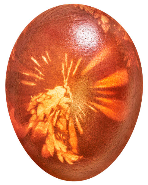 istock Single Red Easter Egg Hand Dyed And Decorated With Weed Leaves Printmaking Technique Isolated On White Background 1062948526