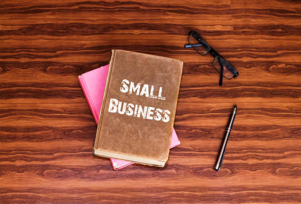 istock Small Business words letter, written on book top, concept 1062951100