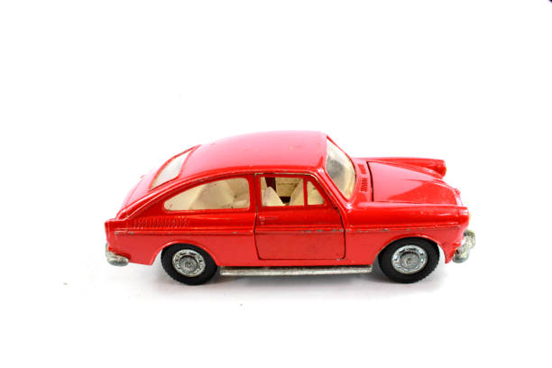 istock Vintage Toy Racing Cars On White Background 1062952588