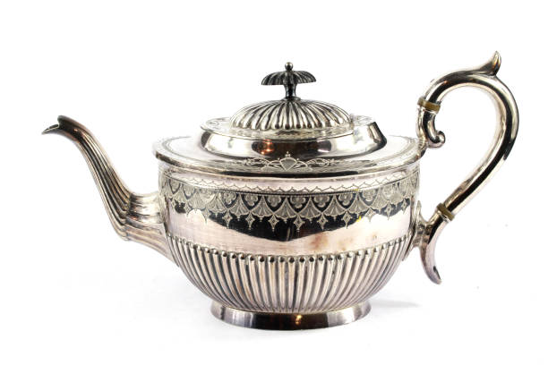 istock Vintage Antique Steam Punk Style Kettle Teapot on White Background 1062952842