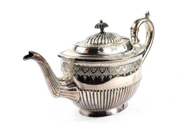 istock Vintage Antique Steam Punk Style Kettle Teapot on White Background 1062952918