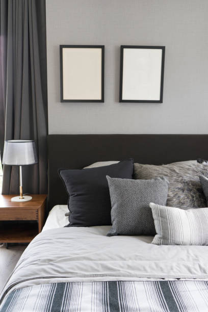 istock Modern bedroom interior with gray pillow on sofa 1062953406