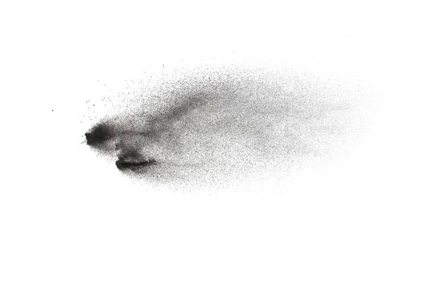 istock Black particles splatter on white background. Black dust splash on white background. 1062961114