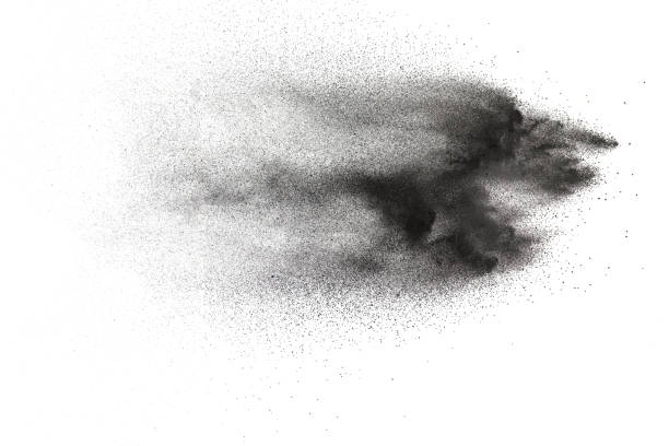 istock Black particles splatter on white background. Black dust splash on white background. 1062961180
