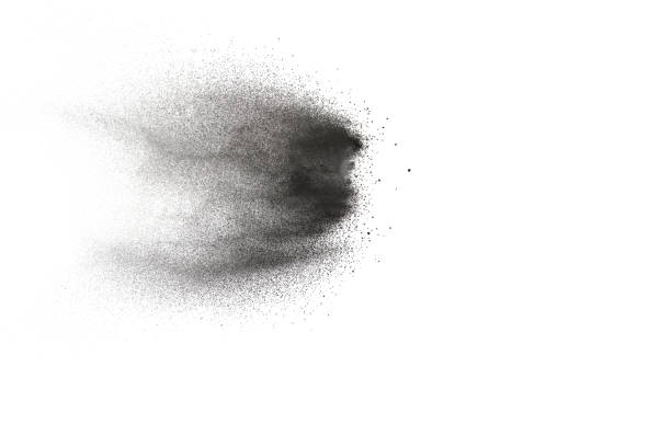istock Black particles splatter on white background. Black dust splash on white background. 1062961182