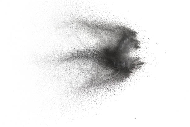 istock Black particles splatter on white background. Black dust splash on white background. 1062961190