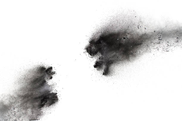 istock Black particles splatter on white background. Black dust splash on white background. 1062961234